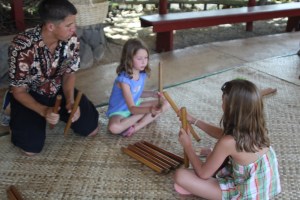 Rylie and Chloe playing sticks like the Maori